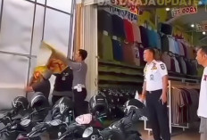 Viral! Anggota Dishub Copot Spanduk Parkir Gratis d MR Busana, Warganet: Pihak Toko Tetap Harus Bayar