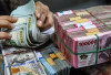 Mata Uang Asia Hajar Dolar AS yang Melemah di Akhir Pekan, Bagaimana Nasib Rupiah?